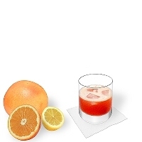 Aperol Sour in a tumbler glass.