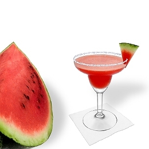 Frozen Watermelon Margarita served in a Margarita glass with a watermelon triangle and sugar or salt rim, the common way of presenting that fruity tequila cocktail.