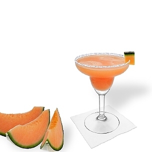 Melon Margarita served in a Margarita glass with a piece of melon and sugar or salt rim, the common way of presenting that fruity tequila cocktail.