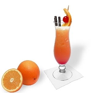 Tequila Sunrise served in a hurricane glass, a great option to present that eye-catching summer cocktail.